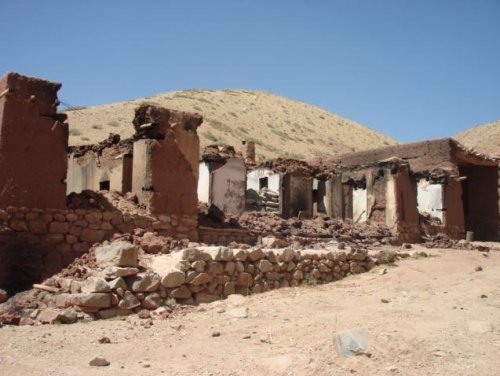 Hazara home burned and looted by Kuchi
