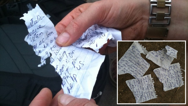 The letter from a Hazara detainee was ripped in pieces and parts of the Ghazni's plea are missing. Source: The Australian