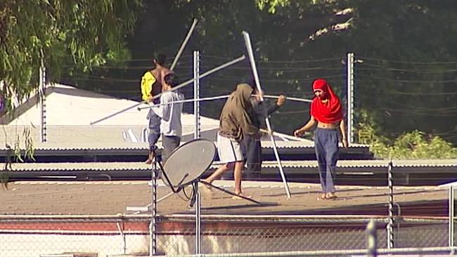 A riot by detainees at Darwin's immigration detention centre yesterday. Source: Supplied