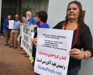 June Mills leads the protest outside the Darwin Magistrates Court. Picture: KATRINA BRIDGEFORD