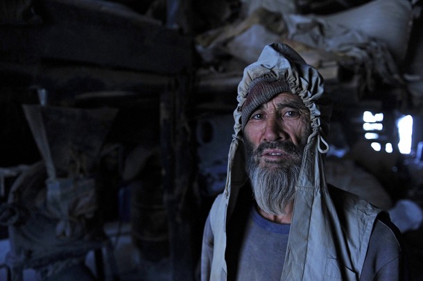 A Hazara day labourer poses for the camera in Kabul's old quarter on June 8, 2011. Hazaras are Turkic people./ Photo by GETTY IMAGES