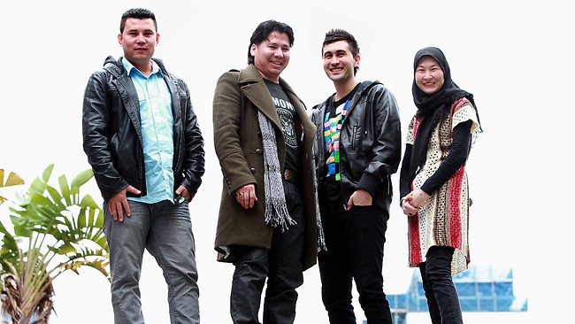 From left, Wahidullah Akbari, Assadullah Nazari, Hussain Ewazi and Zainab Ewazi have vivid memories of their journey on a fishing boat that ended when they were picked up by the Tampa. Picture: Alan Pryke Source: The Australian