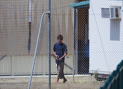 A teenage asylum seeker at the Phosphate Hill Detention Centre, Christmas Island. Photo: James Brickwood Read more: http://www.smh.com.au/national/children-remain-challenge-in-malaysia-plan-20110912-1k629.html#ixzz1XkgVgRQK