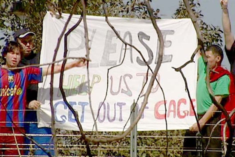 PHOTO: Asylum seekers protest on the roof of the Northern Immigration Detention Centre in Darwin earlier this year. (ABC News)