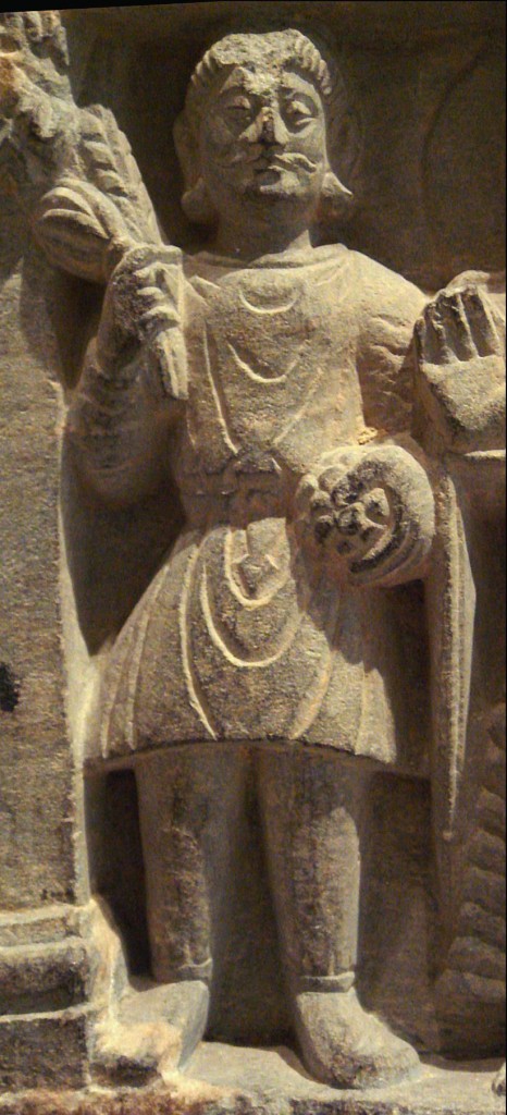 A Buddhist devotee in Kushan dress, Mathura, 2nd century. The Kushan dress is generally depicted as quite stiff, and it is thought it was often made of leather (Francine Tissot, "Gandhara").