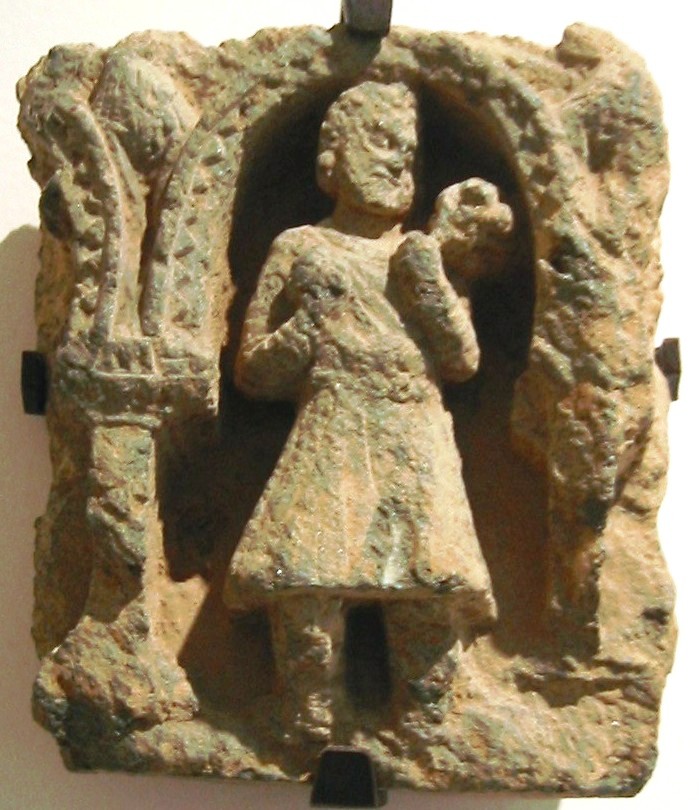Kushan devotee in the traditional costume with tunic and boots, 2nd century, Gandhara