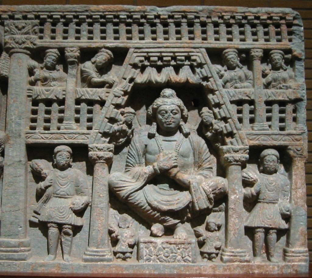 Maitreya, with Kushan devotees, left and right, 2nd century Gandhara